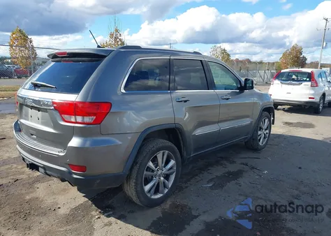 2013 Jeep Grand Cherokee Laredo из США, поврежденный, VIN 1C4RJEAT0DC610804